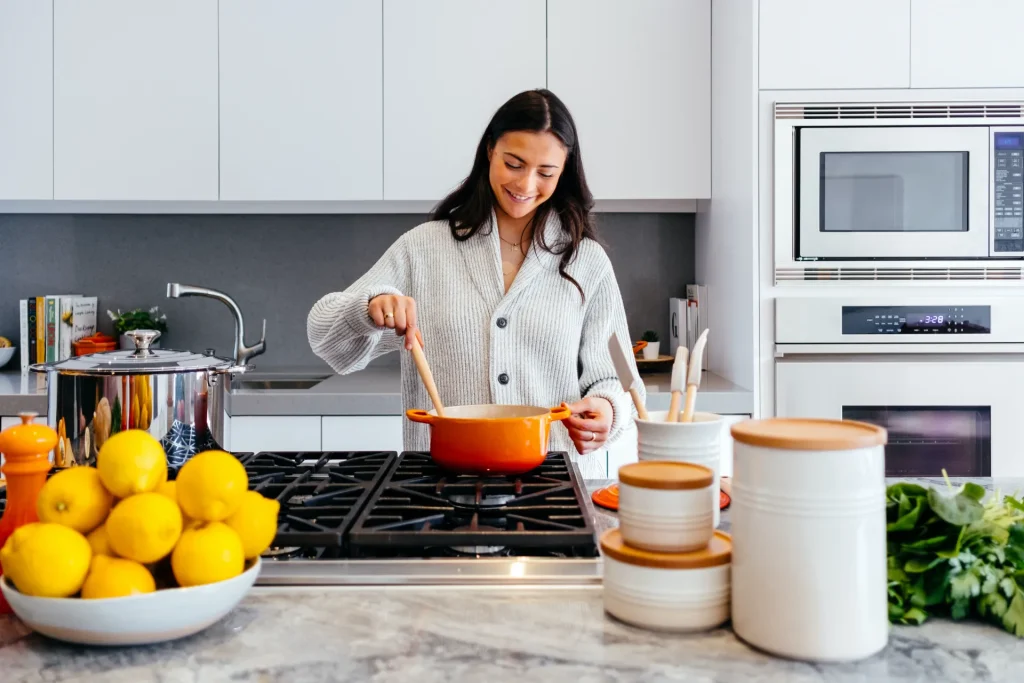 happy person cooking in their new kitchen